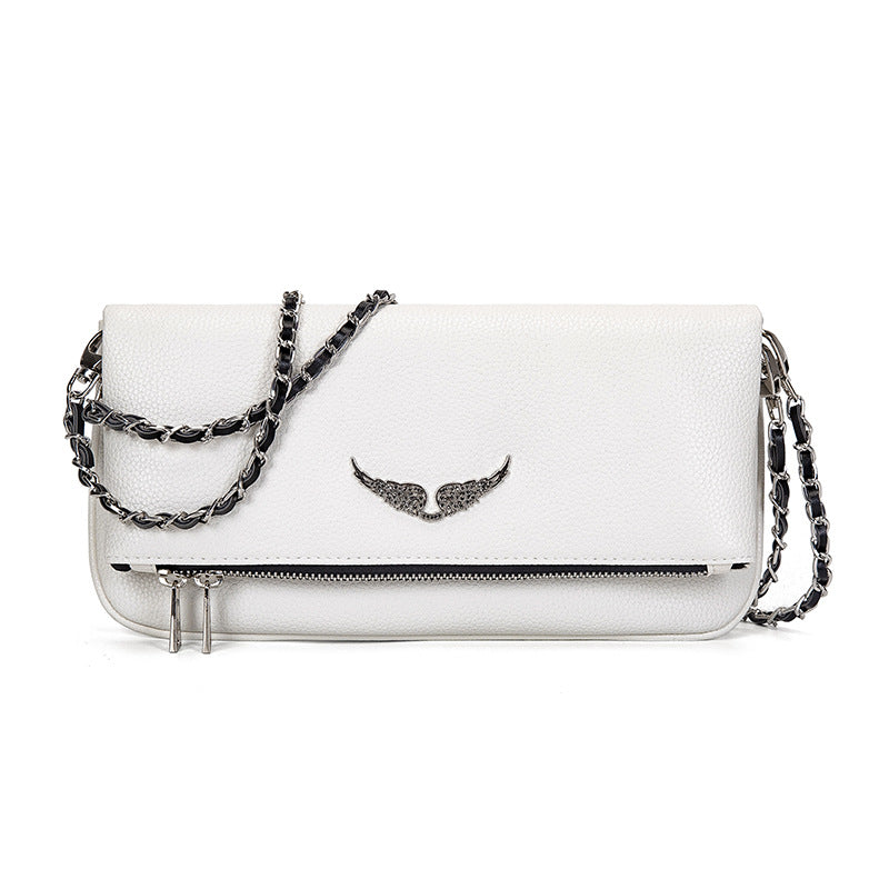 Gesteppte Clutch mit Kettentrageriemen – Elegant und vielseitig Zorenza