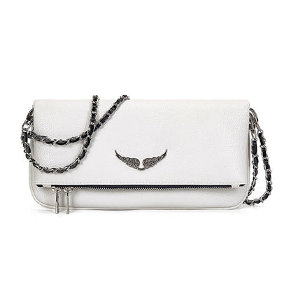 Gesteppte Clutch mit Kettentrageriemen – Elegant und vielseitig Zorenza