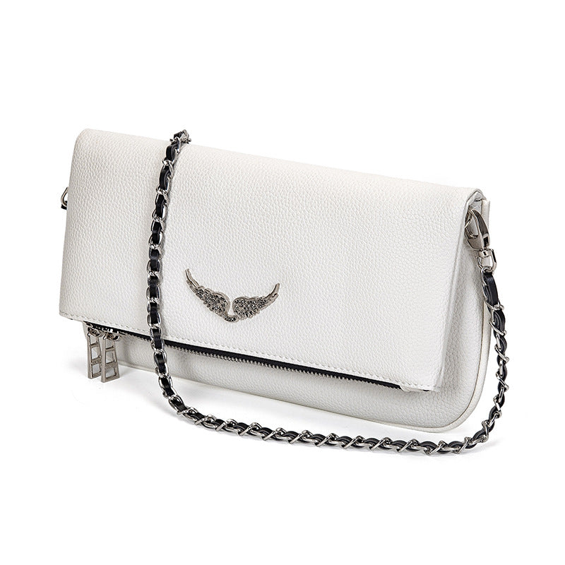 Gesteppte Clutch mit Kettentrageriemen – Elegant und vielseitig Zorenza
