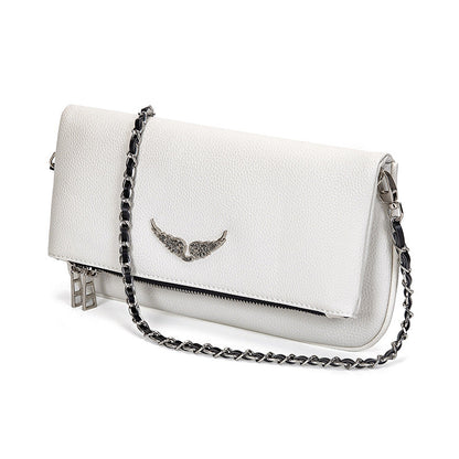 Gesteppte Clutch mit Kettentrageriemen – Elegant und vielseitig Zorenza