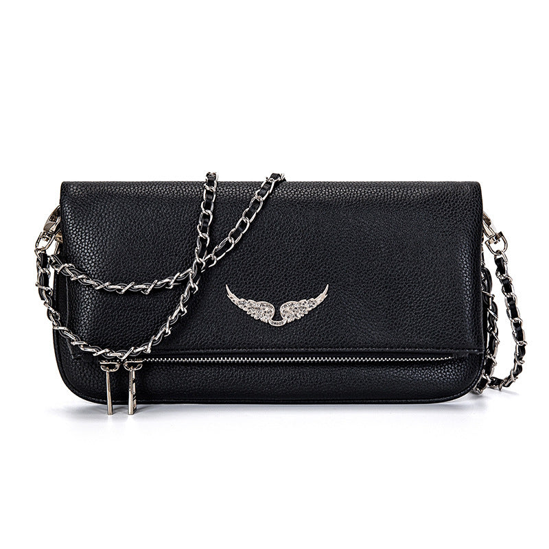 Gesteppte Clutch mit Kettentrageriemen – Elegant und vielseitig Zorenza